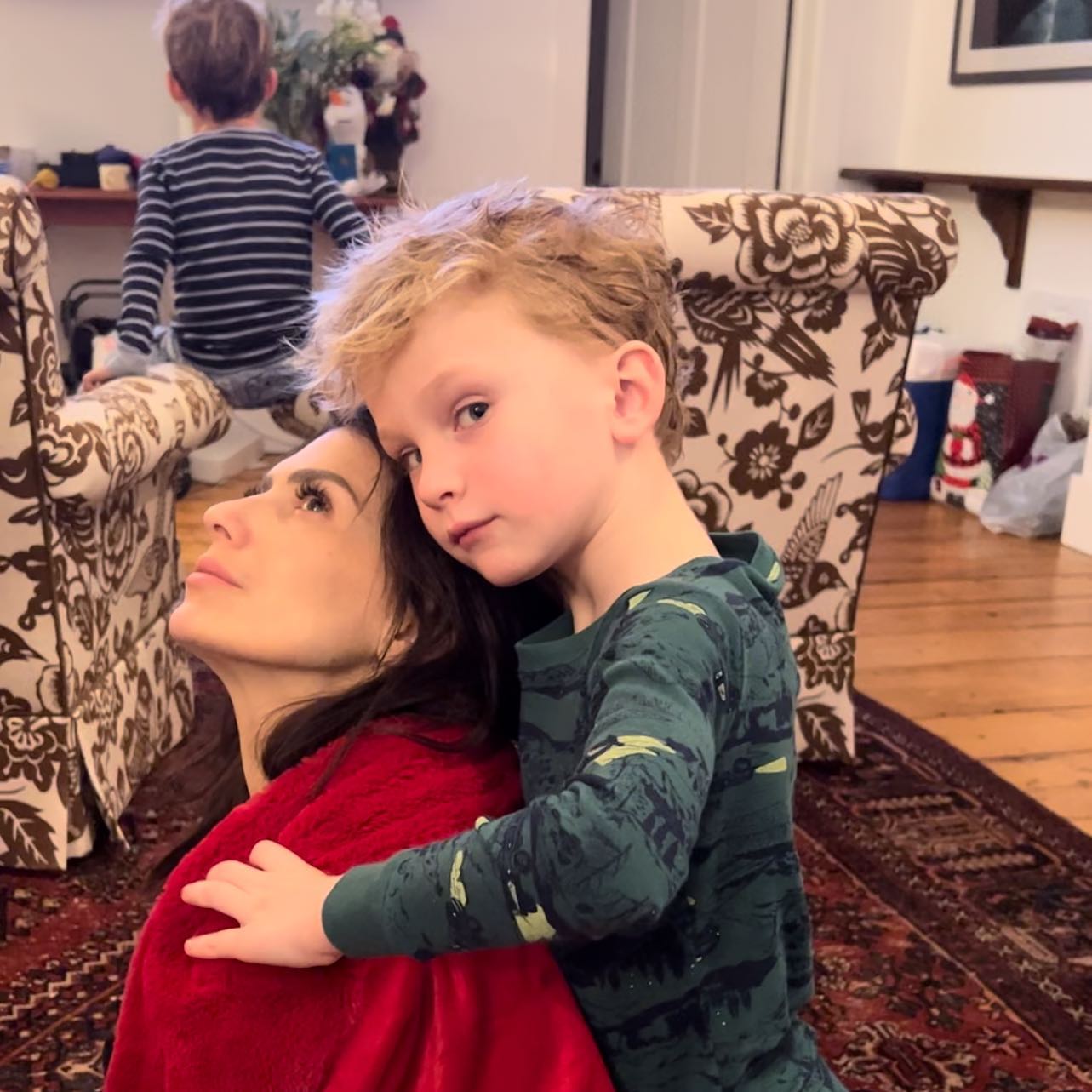 Alec Baldwin posts a photo of his wife and son